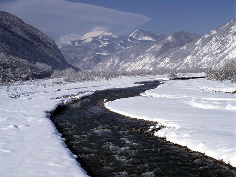Snow-clad river Secchia