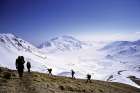 Hikers Climb towards the Mountain Hut Duca degli Abruzzi, in the Background Campo Imperatore