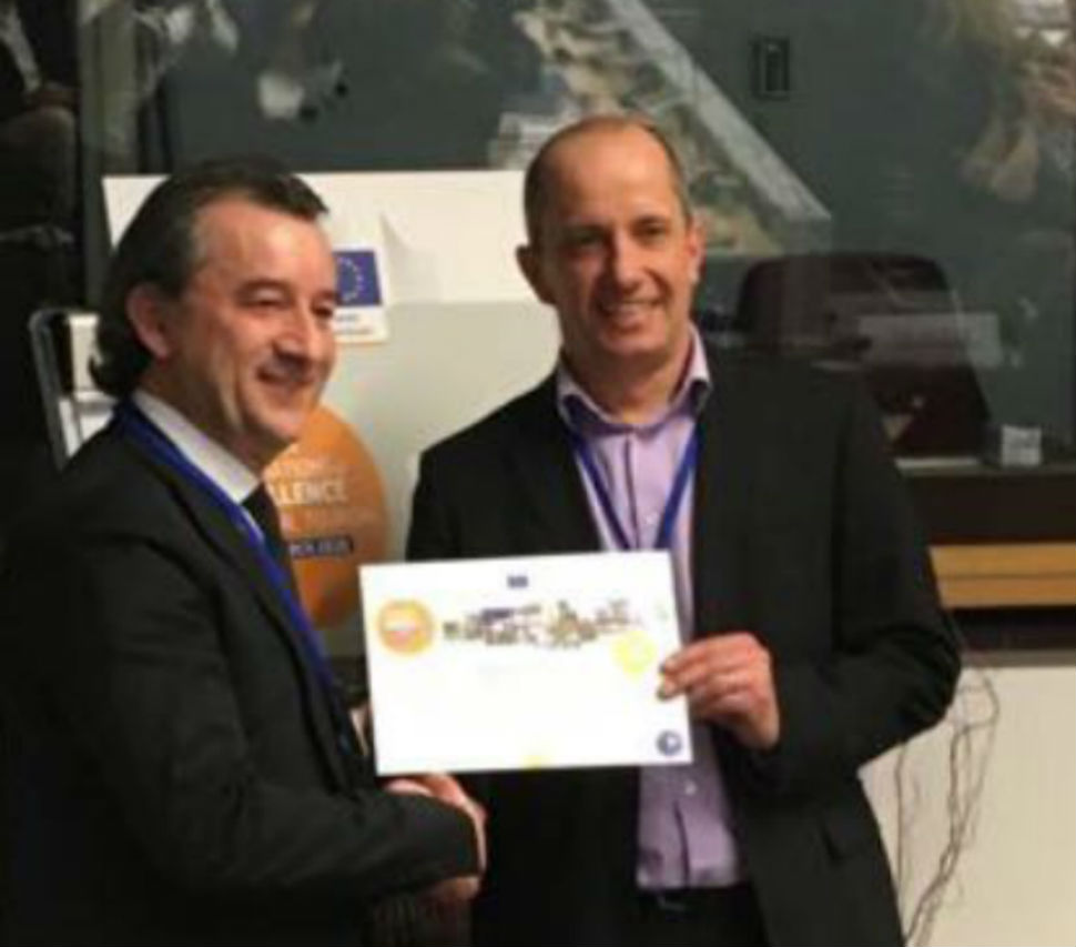 Park president Maurizio Pellizzer accepts the award