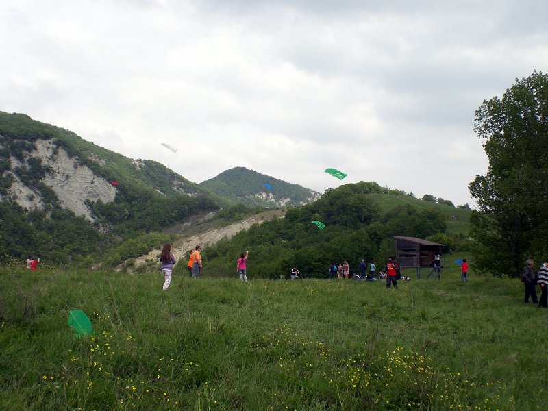 Kites near the turret of Poggiolo, Monte Sole on the background