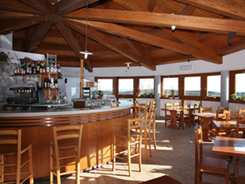 The restaurant of the Gradina visitor center, with its round shape featuring large windows overlooking the sea