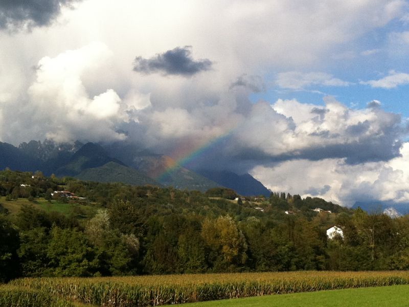 Regenbogen über den Belluneser Dolomiten